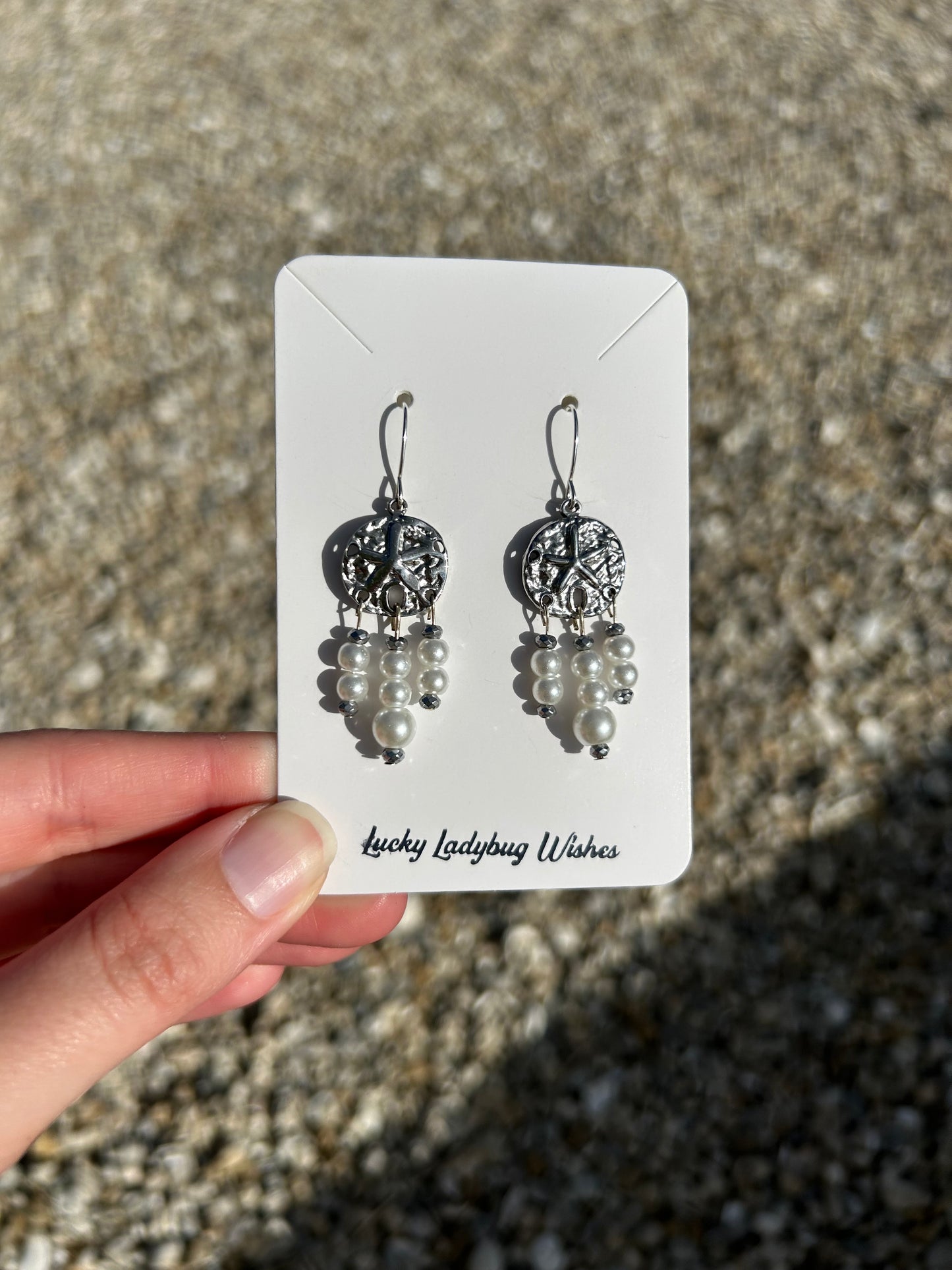 Sand dollar charm earrings